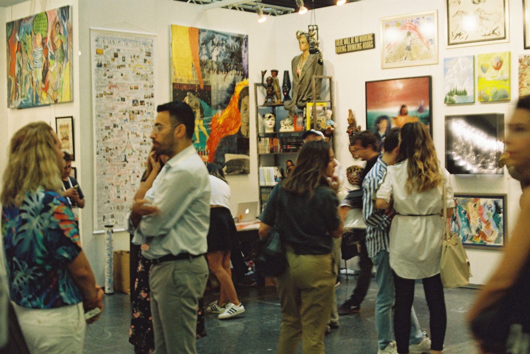 Visitors exploring an art gallery together